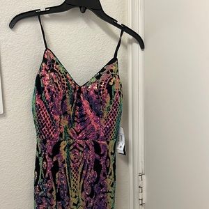Black Dillards dress with rainbow metallic details size 3